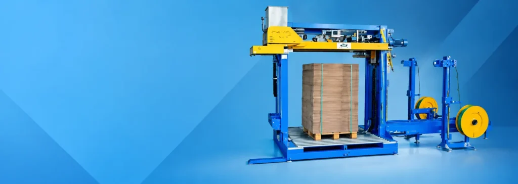 Compression strapping machine for corrugated pallet loads